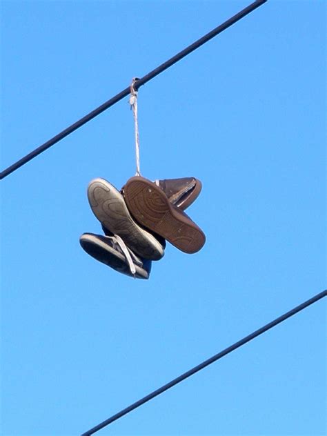 shoes on telephone line meaning